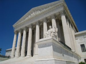 Supreme Court of the United States. Public Domain. 1280px-Oblique_facade_2,_US_Supreme_Court