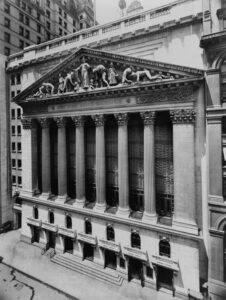 The Broad Street facade of the New York Stock Exchange. {Public Domain.).