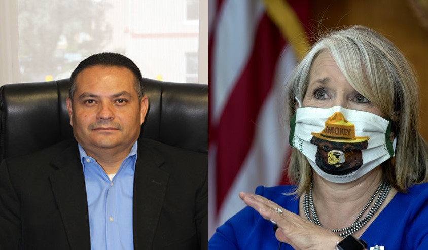 DFA Division Director Donnie Quintana and Governor Michelle Lujan Grisham.