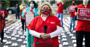 Screenshot from NNU Video of Nurses in Front of Trump White House Remembering Victims of COVID 19. Advocating Stronger Protections for Frontline Workers.