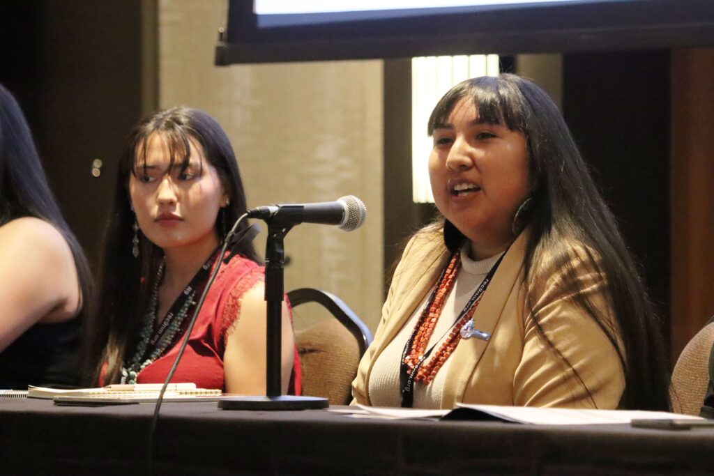Alysia Coriz Kewa of Pueblo, at Native American Summit with New Mexico Governor, May 2023. UNM Alumna.jpg.